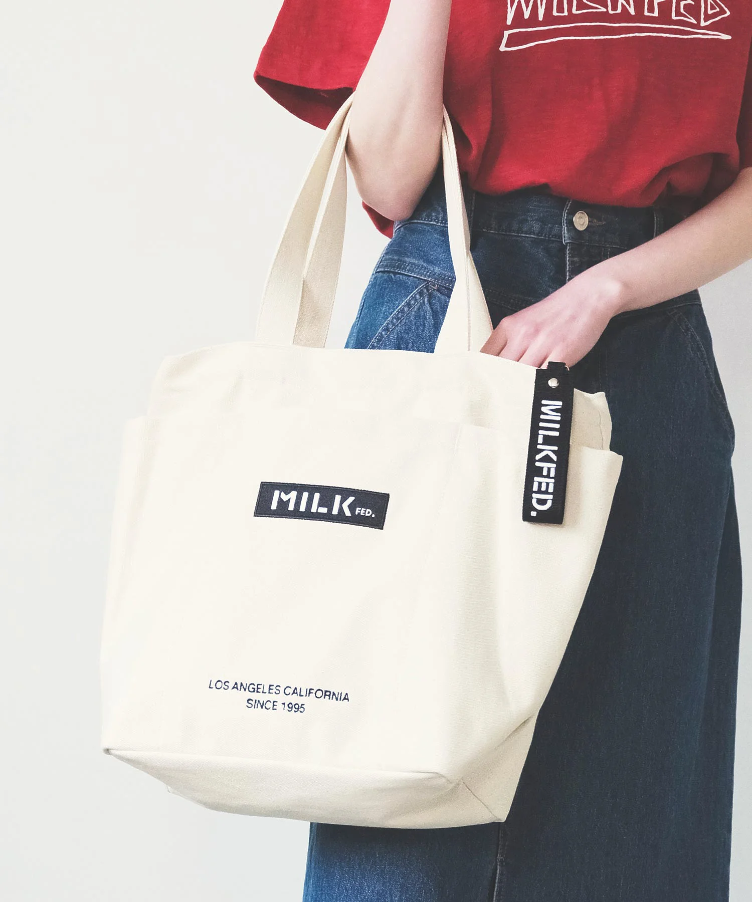 BAR AND UNDER LOGO BIG CANVAS BAG MILKFED. - Image 24
